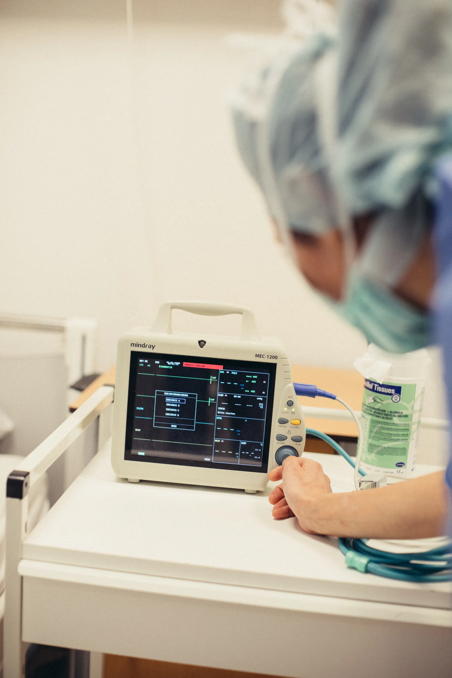 Nurse checking the readings on the monitoring screen